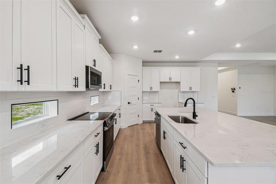 Furnished interior view inside a new home in Hidden Ridge, New Port Richey (Image 11). Furnished interior view inside a new home in Hidden Ridge, New Port Richey (Image 11).