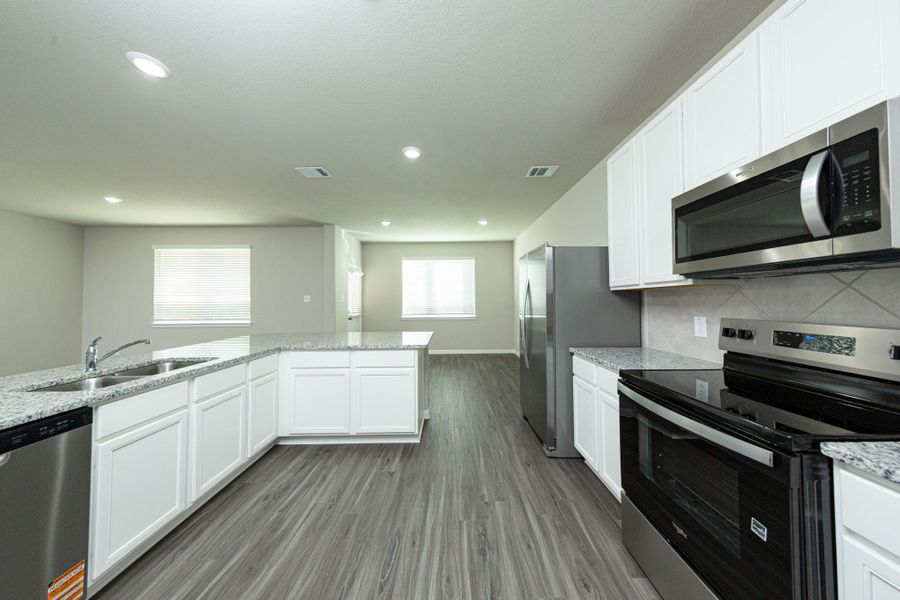 Furnished interior view inside a new home in Wayside Village, Houston (Image 5). Furnished interior view inside a new home in Wayside Village, Houston (Image 5).