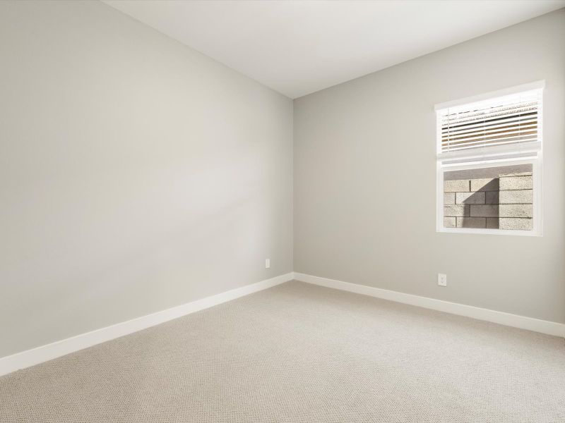 Spacious, unfurnished interior of a new home in White Tank Foothills Signature Series, Waddell (Image 12).