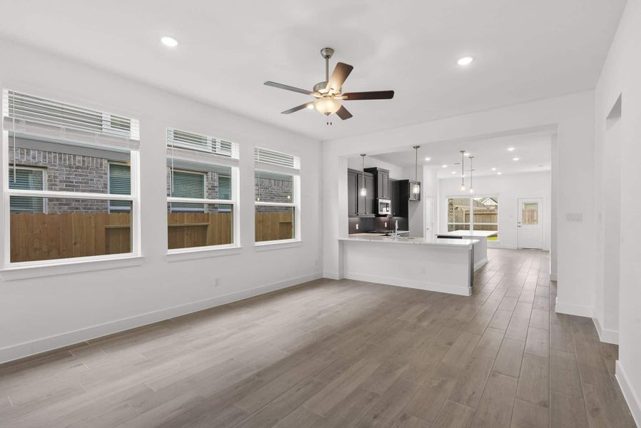Representative unfurnished interior of a home built from the Carlisle by Chesmar Homes in Sunterra, Katy (Image 8).