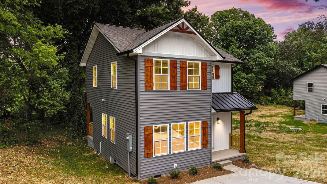 Front exterior of a new home in , Gastonia, NC, highlighting curb appeal (Image 2). Front exterior of a new home in , Gastonia, NC, highlighting curb appeal (Image 2).
