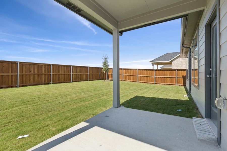 Covered Patio in the Masters home plan by Trophy Signature Homes – REPRESENTATIVE PHOTO Covered Patio in the Masters home plan by Trophy Signature Homes – REPRESENTATIVE PHOTO