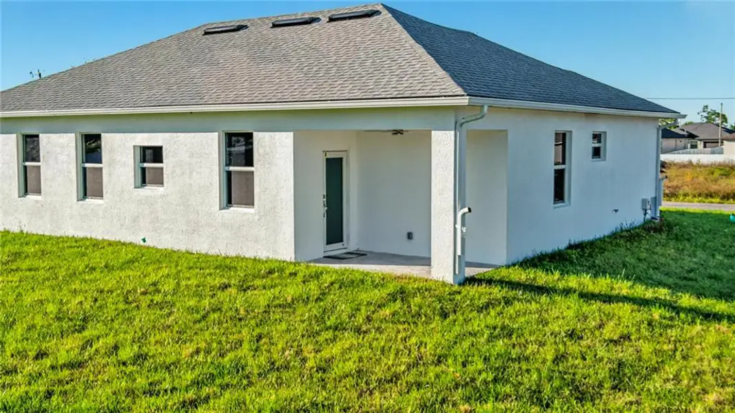Exterior details and patio area of a home in , Lehigh Acres (Image 3).