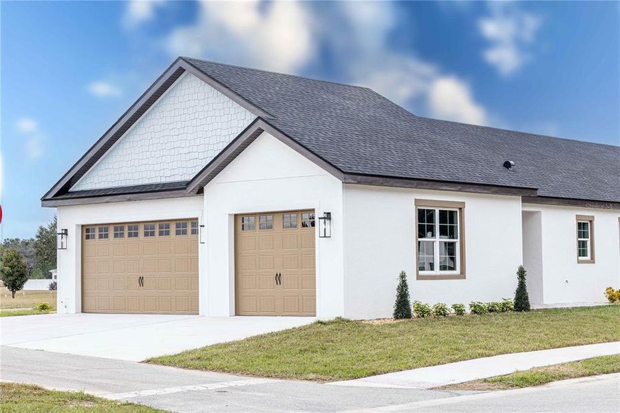 Front exterior of a new home in , Oxford, FL, highlighting curb appeal (Image 23).