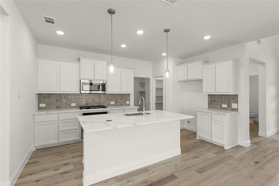 Furnished interior view inside a new home in La Terra at Uptown Celina, Celina (Image 7).