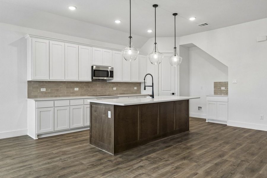 Furnished interior view inside a new home in Brahman Ranch, Venus (Image 6).