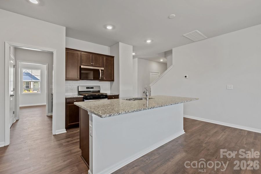 Furnished interior view inside a new home in McFarland Estates, York (Image 7).