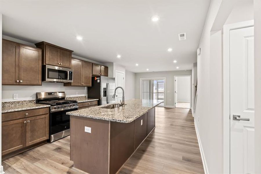 Furnished interior view inside a new home in Lakes at Riverbend, Navassa (Image 3).