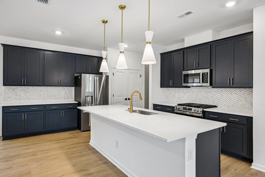Kitchen featuring the AW Collection® Sapphire - Vibrant blues and crisp whites steal the show. Kitchen featuring the AW Collection® Sapphire - Vibrant blues and crisp whites steal the show.