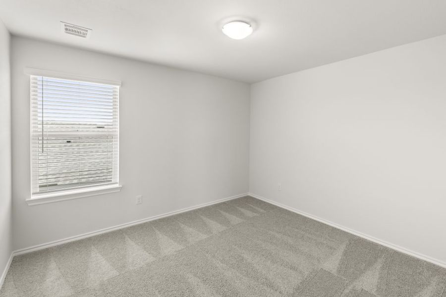 Representative exterior photo of a completed home built from the Maple by Impression Homes in Northspur, Terrell, TX (Image 18).