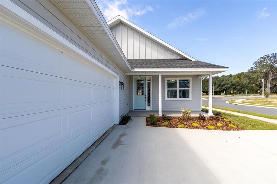Front exterior of a new home in , Alachua, FL, highlighting curb appeal (Image 15).