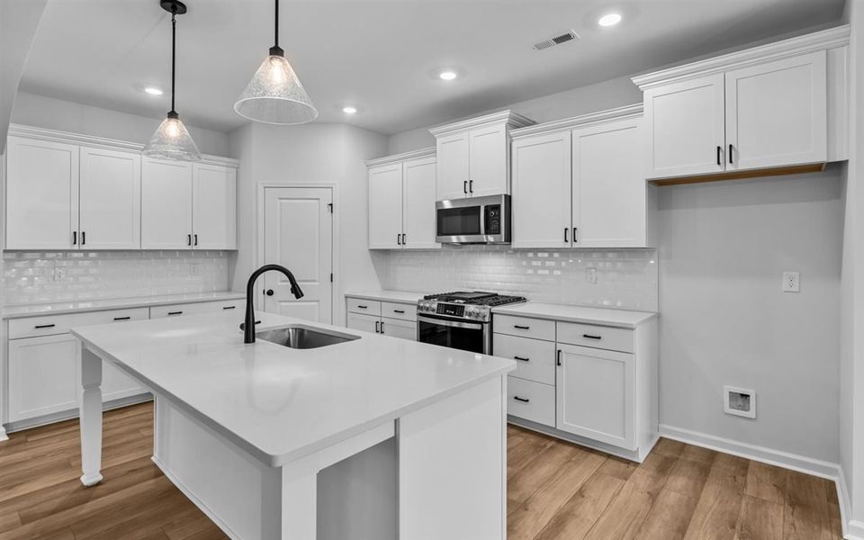Furnished interior view inside a new home in Brayden, Advance (Image 8).