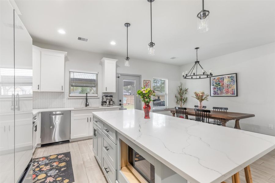 Furnished interior view inside a new home in , Roman Forest (Image 12).