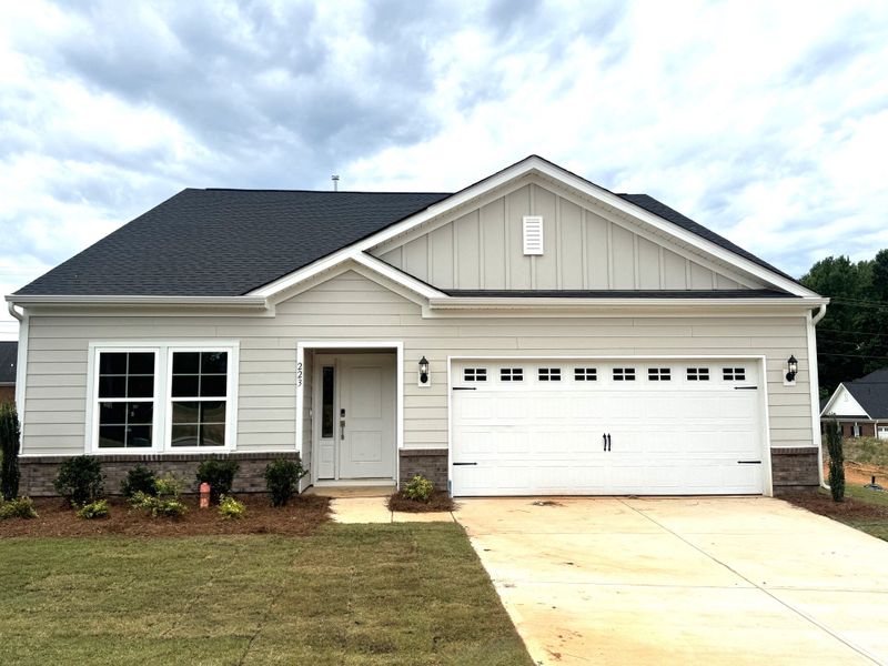 Front exterior of a new home in Willowbrook, Shelby, NC, highlighting curb appeal (Image 1). Front exterior of a new home in Willowbrook, Shelby, NC, highlighting curb appeal (Image 1).