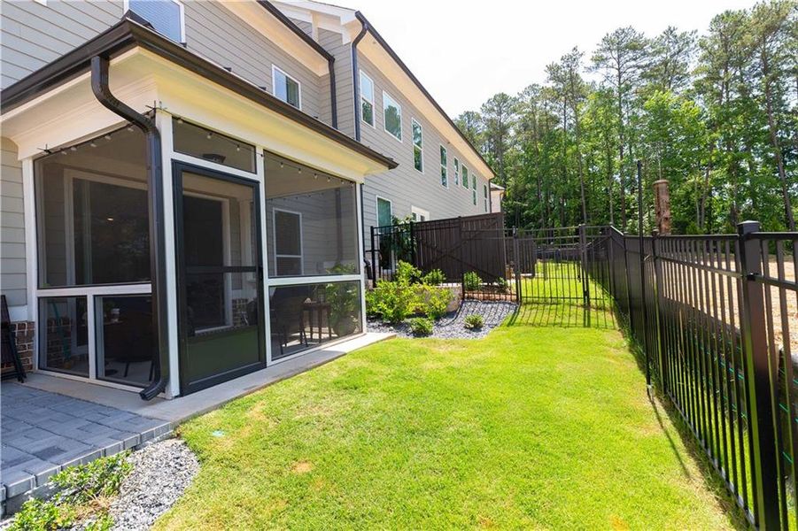 Exterior details and patio area of a home in Waterside Townhomes, Peachtree Corners (Image 3). Exterior details and patio area of a home in Waterside Townhomes, Peachtree Corners (Image 3).