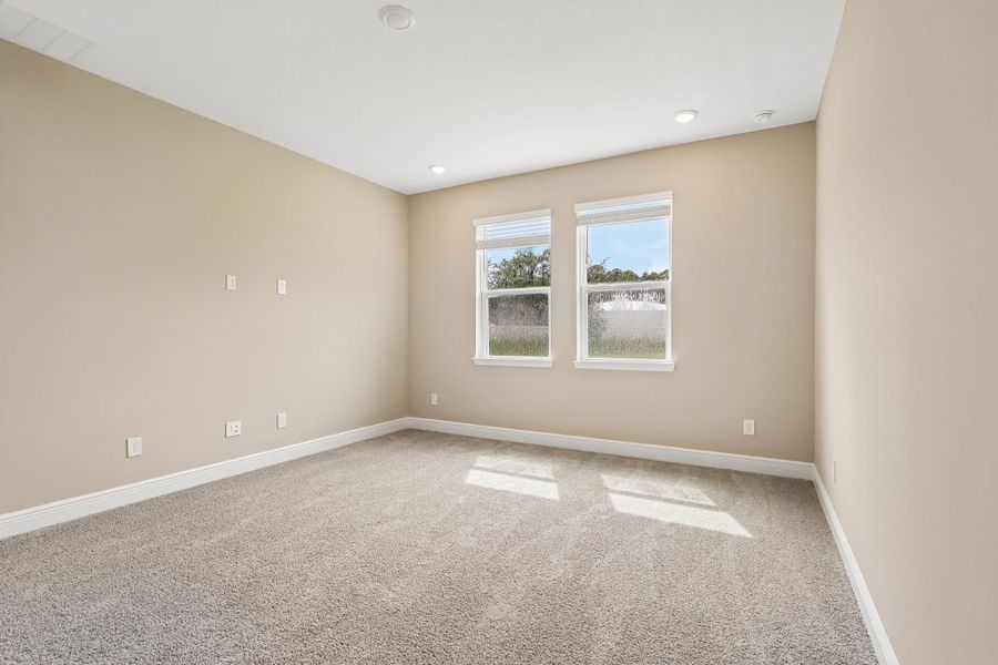 Spacious, unfurnished interior of a new home in Legends Preserve - Signature Series, Daytona Beach (Image 14).