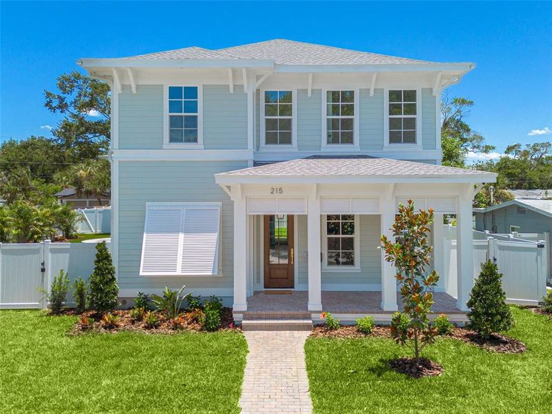 Front exterior of a new home in , St. Petersburg, FL, highlighting curb appeal (Image 4).