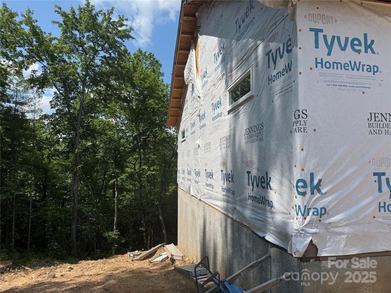 Front exterior of a new home in , Lake Toxaway, NC, highlighting curb appeal (Image 11). Front exterior of a new home in , Lake Toxaway, NC, highlighting curb appeal (Image 11).