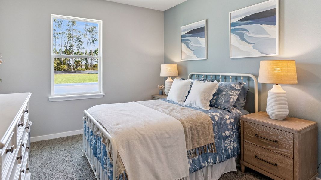 Furnished interior view inside a new home in Halifax Plantation Villas, Ormond Beach (Image 12).