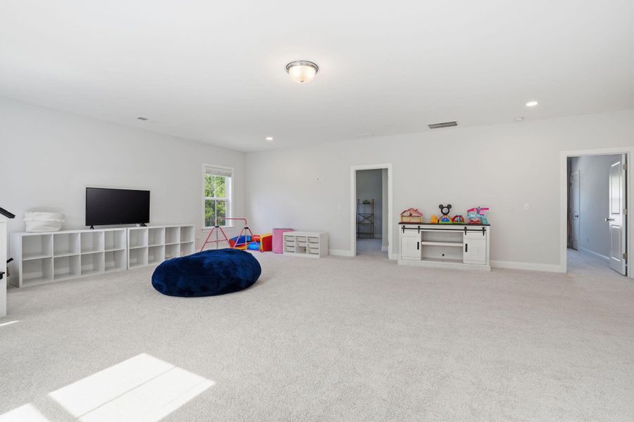 Furnished interior view inside a new home in Tidewater at Lakes of Cane Bay, Summerville (Image 14).