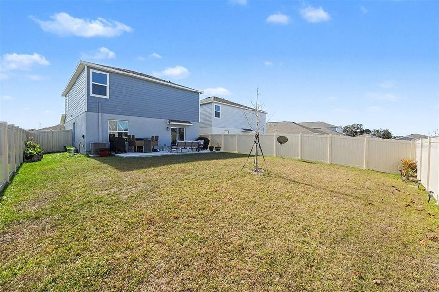 Exterior details and patio area of a home in Peace Creek Reserve, Winter Haven (Image 2).