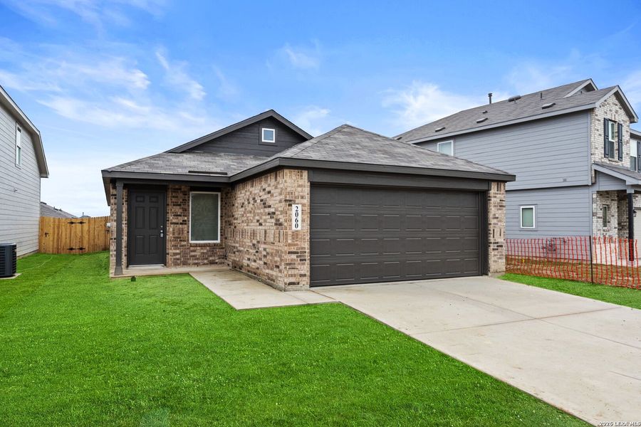 Front exterior of a new home in Randolph Crossing: Cottage Collection, Converse, TX, highlighting curb appeal (Image 1). Front exterior of a new home in Randolph Crossing: Cottage Collection, Converse, TX, highlighting curb appeal (Image 1).