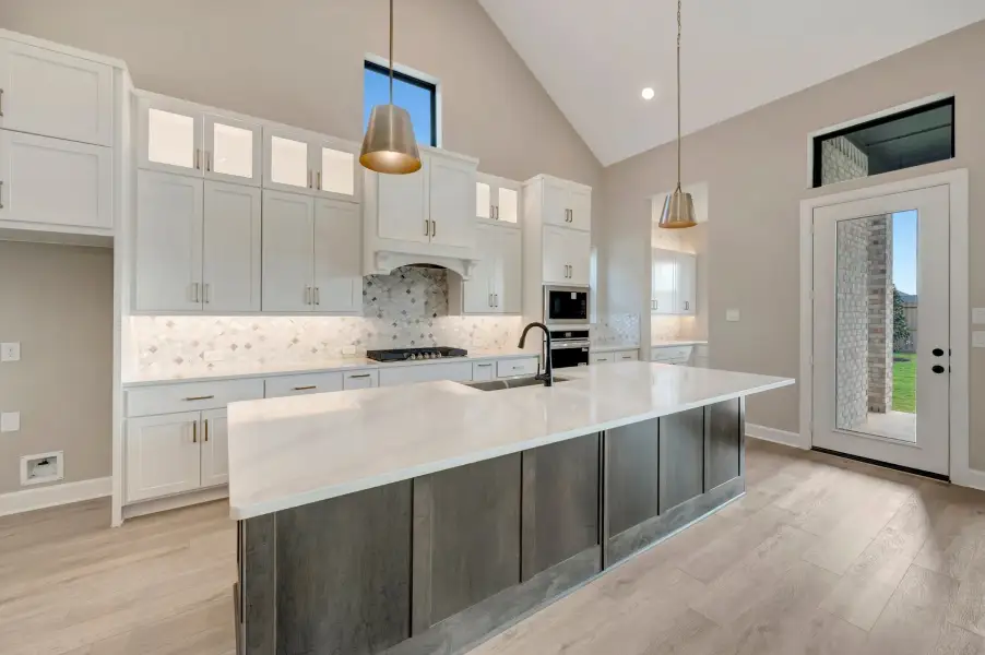 Furnished interior view inside a new home in The Highlands Encore - Harbor Collection, Porter (Image 7).