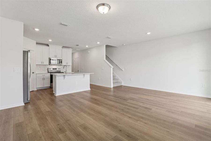 Spacious, unfurnished interior of a new home in Cagan Crossings West, Clermont (Image 33).