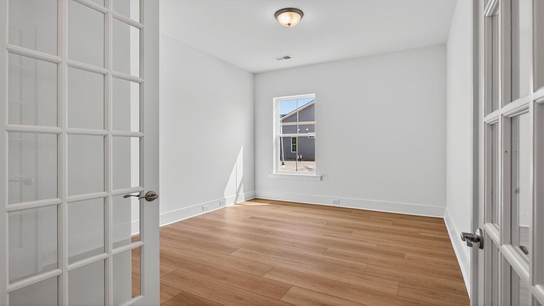 Spacious, unfurnished interior of a new home in Summerwind Crossing at Lakes of Cane Bay, Summerville (Image 13). Spacious, unfurnished interior of a new home in Summerwind Crossing at Lakes of Cane Bay, Summerville (Image 13).