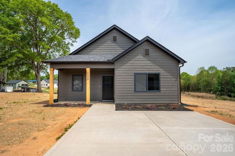 Front exterior of a new home in , Lincolnton, NC, highlighting curb appeal (Image 2). Front exterior of a new home in , Lincolnton, NC, highlighting curb appeal (Image 2).