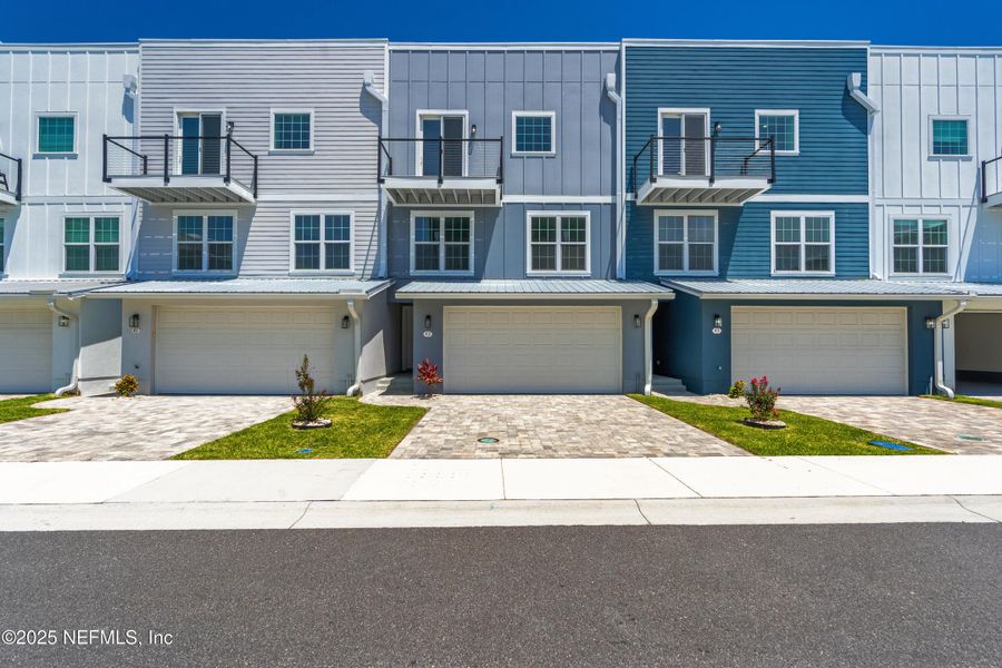 Front exterior of a new home in , St. Augustine, FL, highlighting curb appeal (Image 27).