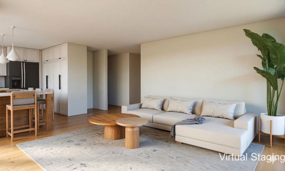 Rendered view of living room primary seating area with virtual staging (furniture to scale)