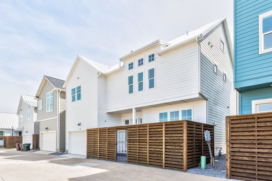Front exterior of a new home in Concourse at Mueller, Austin, TX, highlighting curb appeal (Image 15). Front exterior of a new home in Concourse at Mueller, Austin, TX, highlighting curb appeal (Image 15).