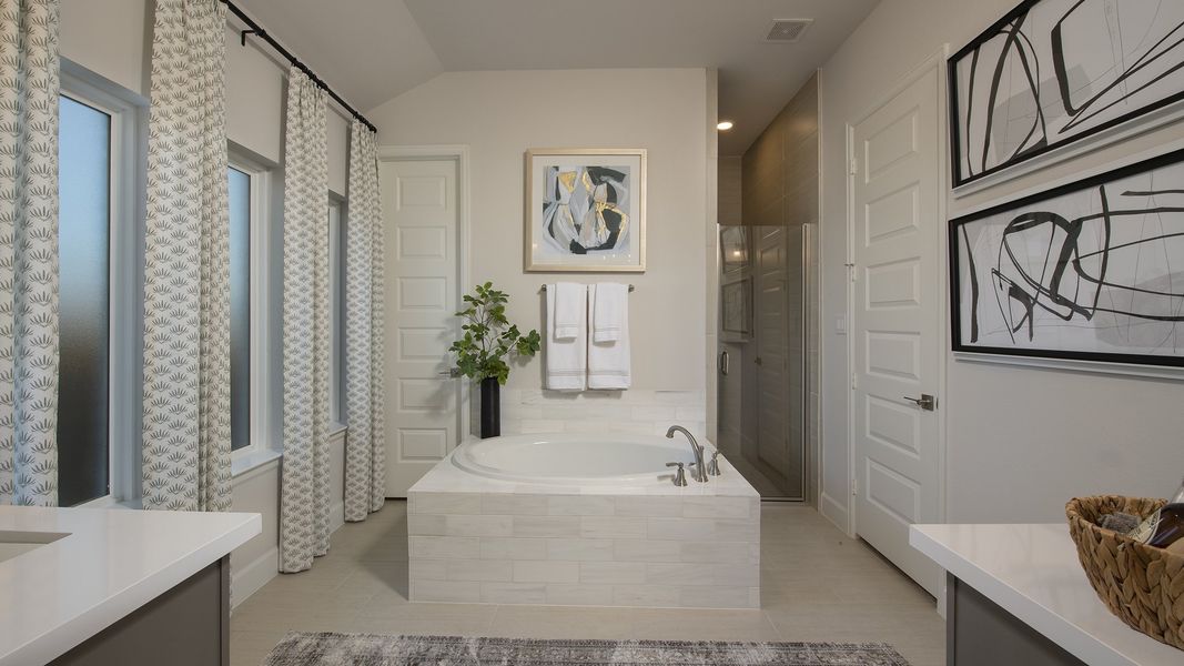 Representative furnished interior of a home built from the 2949M by Perry Homes in Lakes of Cane Island, Katy (Image 8).