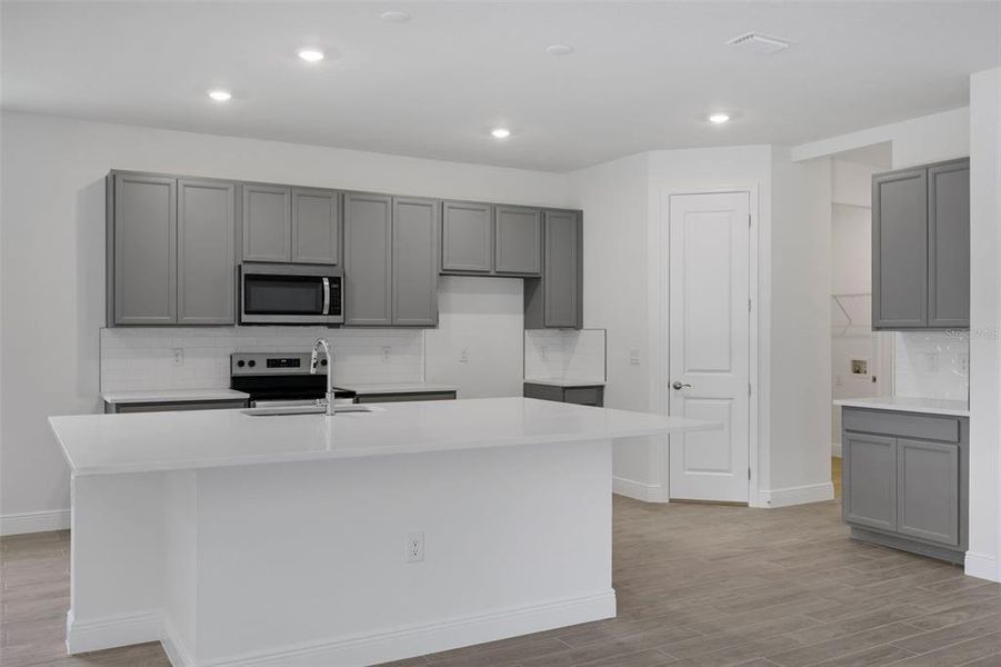 Furnished interior view inside a new home in Angeline, Land O' Lakes (Image 7).