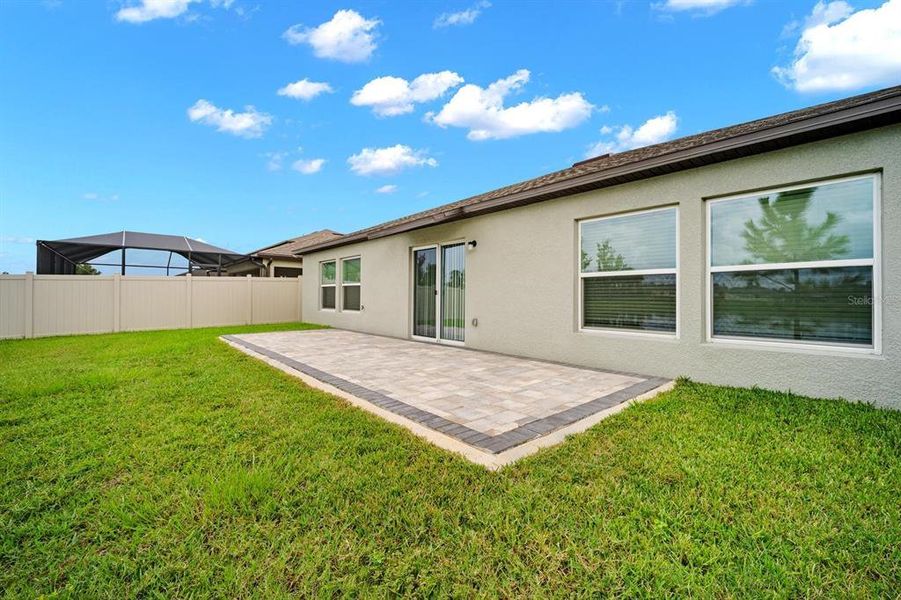 Exterior details and patio area of a home in North Park Isle, Plant City (Image 3).