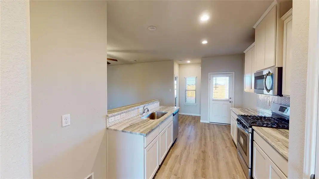 Furnished interior view inside a new home in Splendora Fields, Splendora (Image 7).