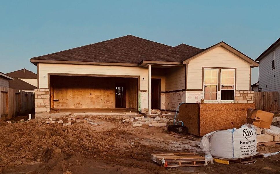 Exterior details and patio area of a home in Liberty Collection at Granger Pines, Conroe (Image 2).