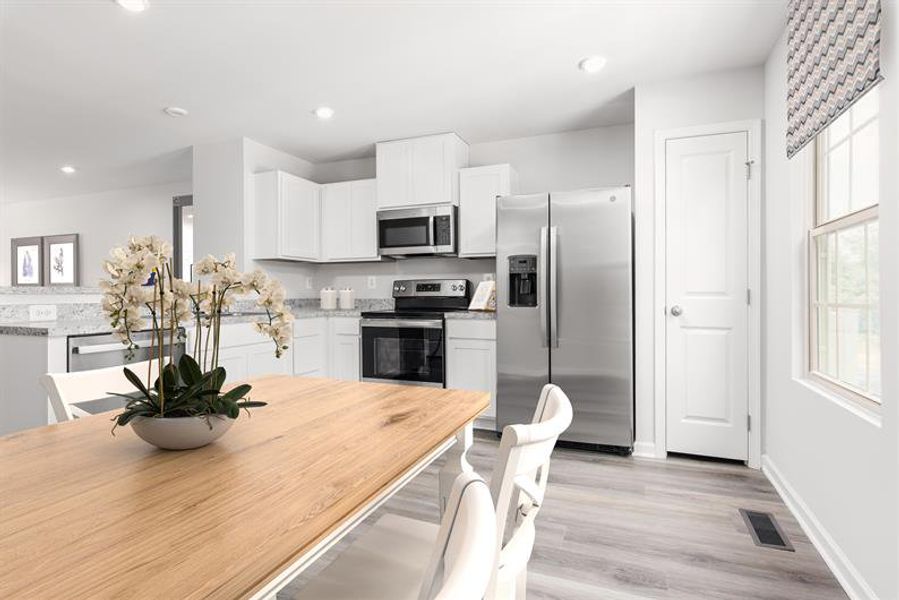 Representative furnished interior of a home built from the Spencer by Ryan Homes in Northerly, Charlotte (Image 7).