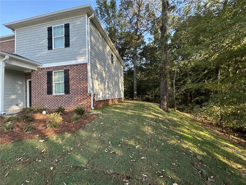 Exterior details and patio area of a home in , Cartersville (Image 17).