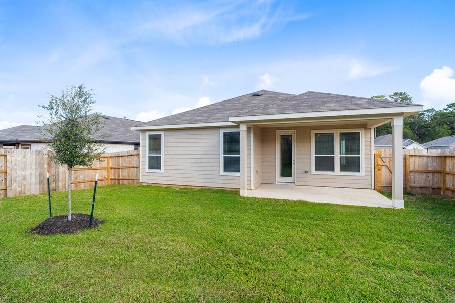 Exterior details and patio area of a home in Mustang Ridge, Magnolia (Image 2).
