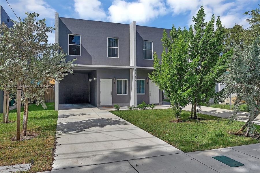 Front exterior of a new home in , Miami, FL, highlighting curb appeal (Image 1).