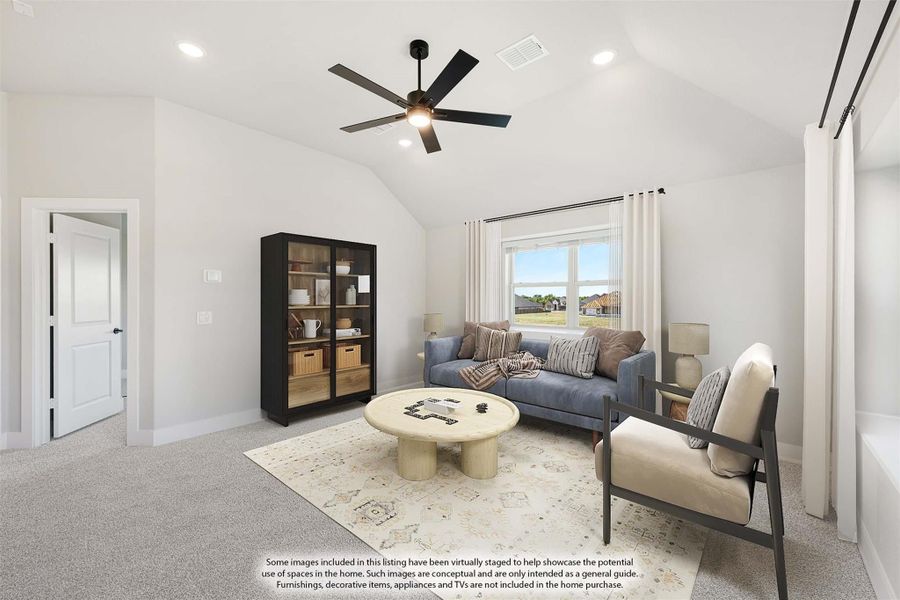 Bonus room with vaulted ceiling, ceiling fan, carpet flooring, and blue sofa seating area