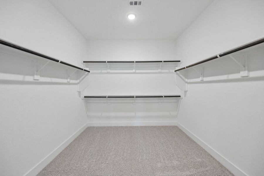 Representative unfurnished interior of a home built from the Amherst by Pulte Homes in Mavera, Conroe (Image 21).