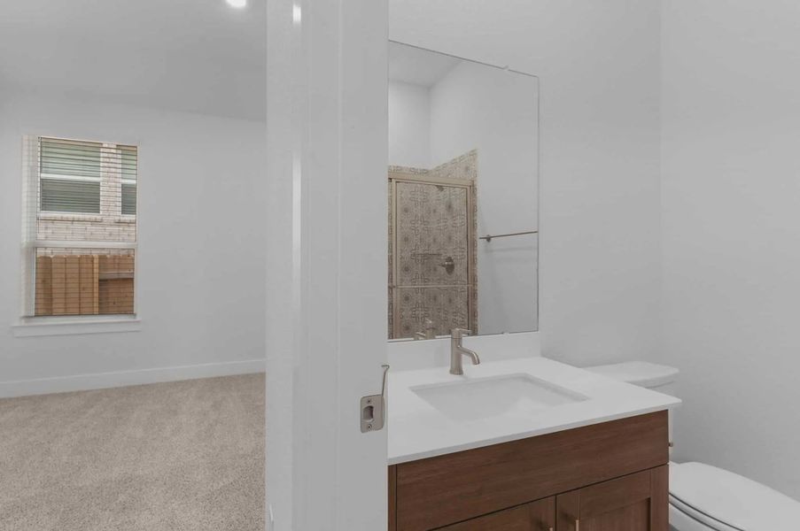 Representative furnished interior of a home built from the Mariah by Chesmar Homes in University Heights, McKinney (Image 6).