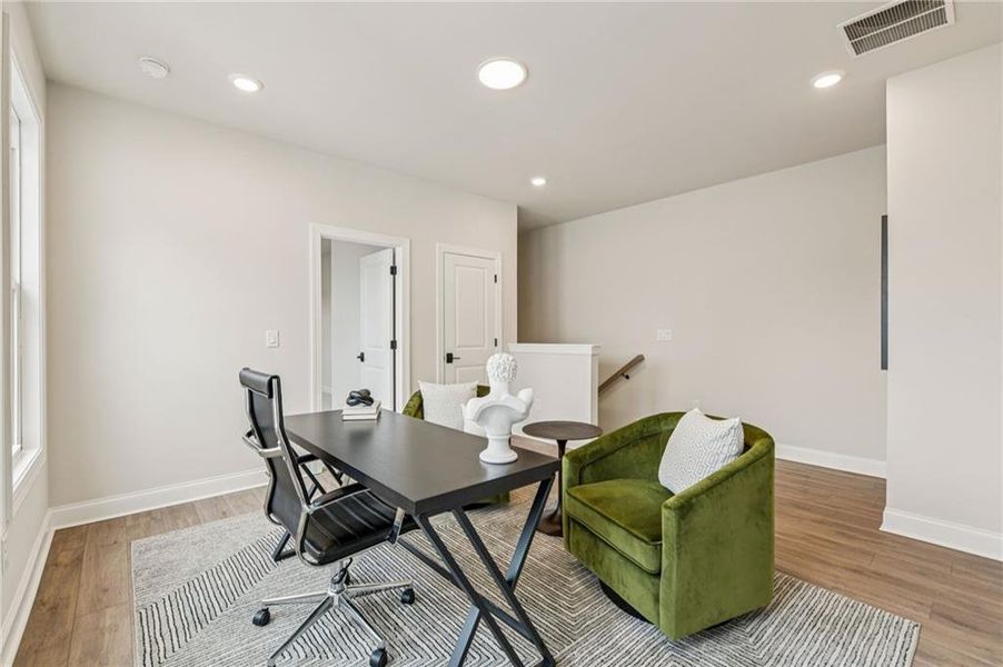 Furnished interior view inside a new home in Promenade at Sawnee Village, Cumming (Image 8).