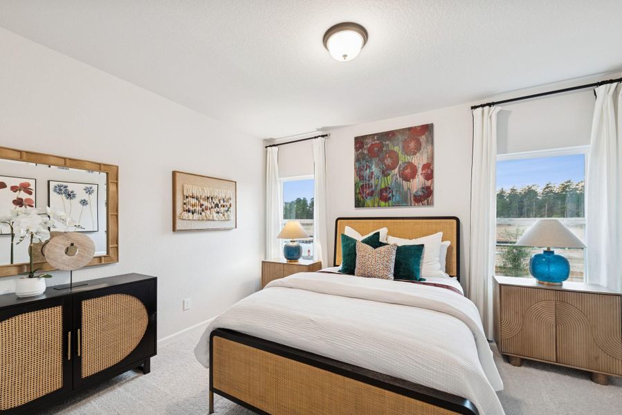 The Princeton II- Bedroom 2. Staged model home shown for illustration only; actual features, colors, and upgrades may vary.