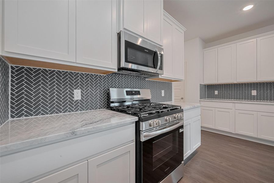 Furnished interior view inside a new home in Mill Creek Trails, Magnolia (Image 9).