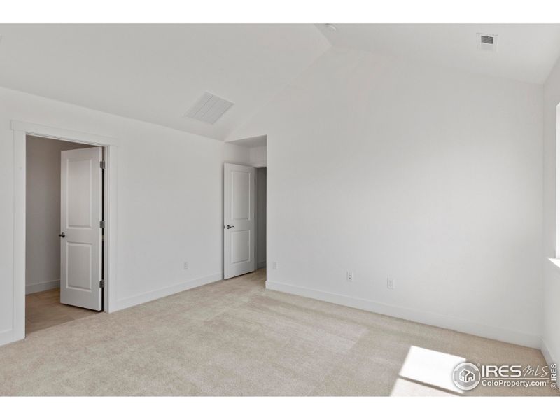 Spacious, unfurnished interior of a new home in Trailside on Harmony, Timnath (Image 12).