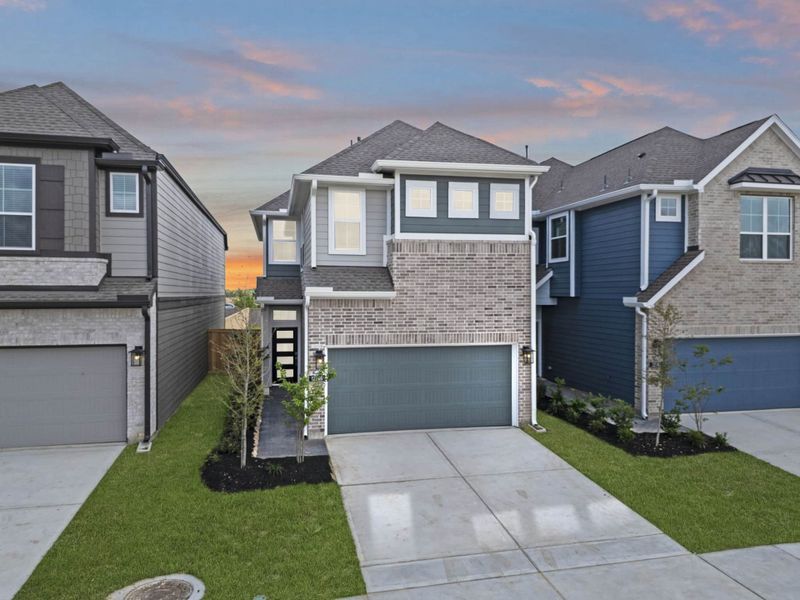 Front exterior of a new home in Bridgeland, Cypress, TX, highlighting curb appeal (Image 20).